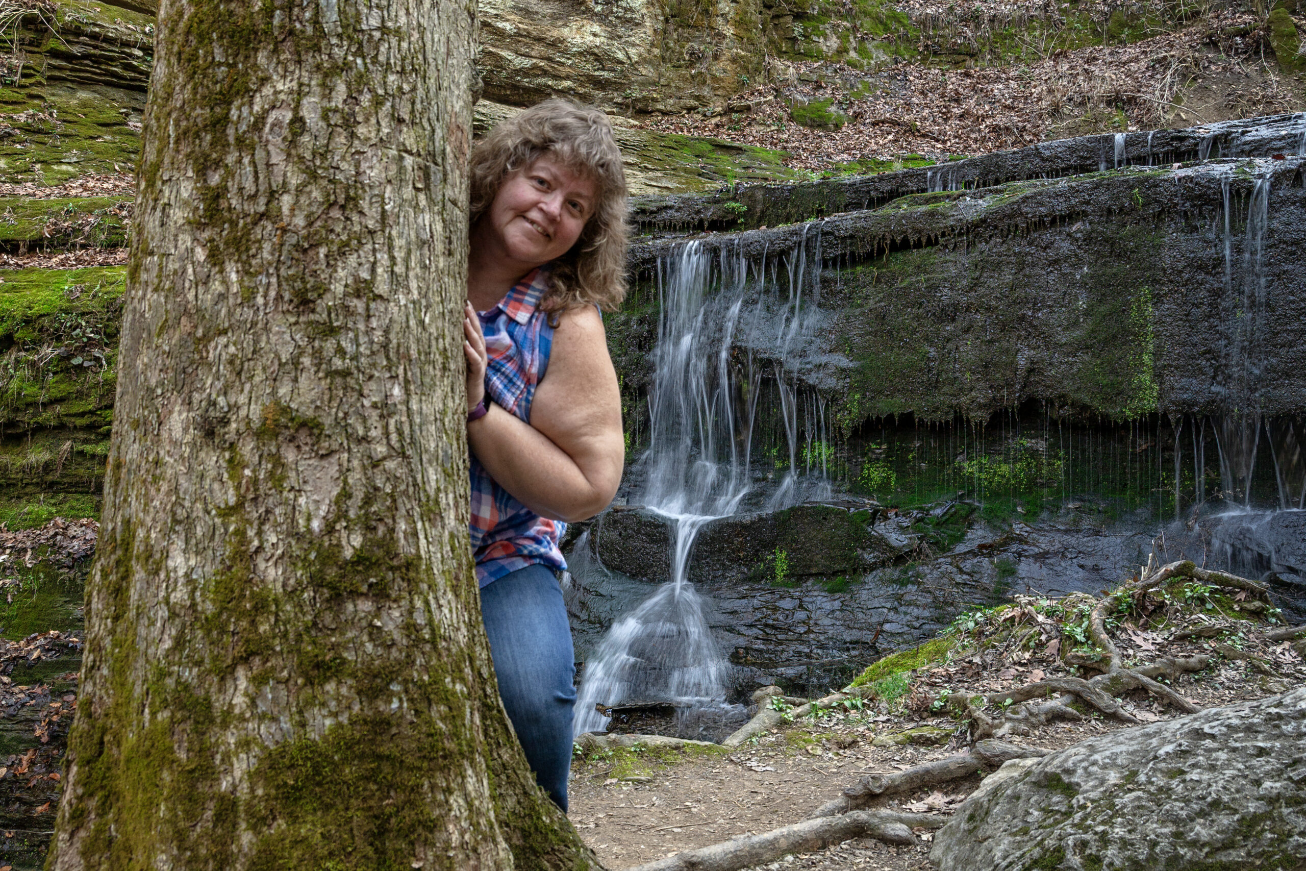 Tina Faye Photography by waterfall in Tennessee.